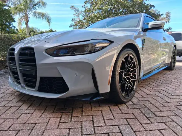 White BMW M4 ceramic coating and paint protection services with professional auto detailing finish