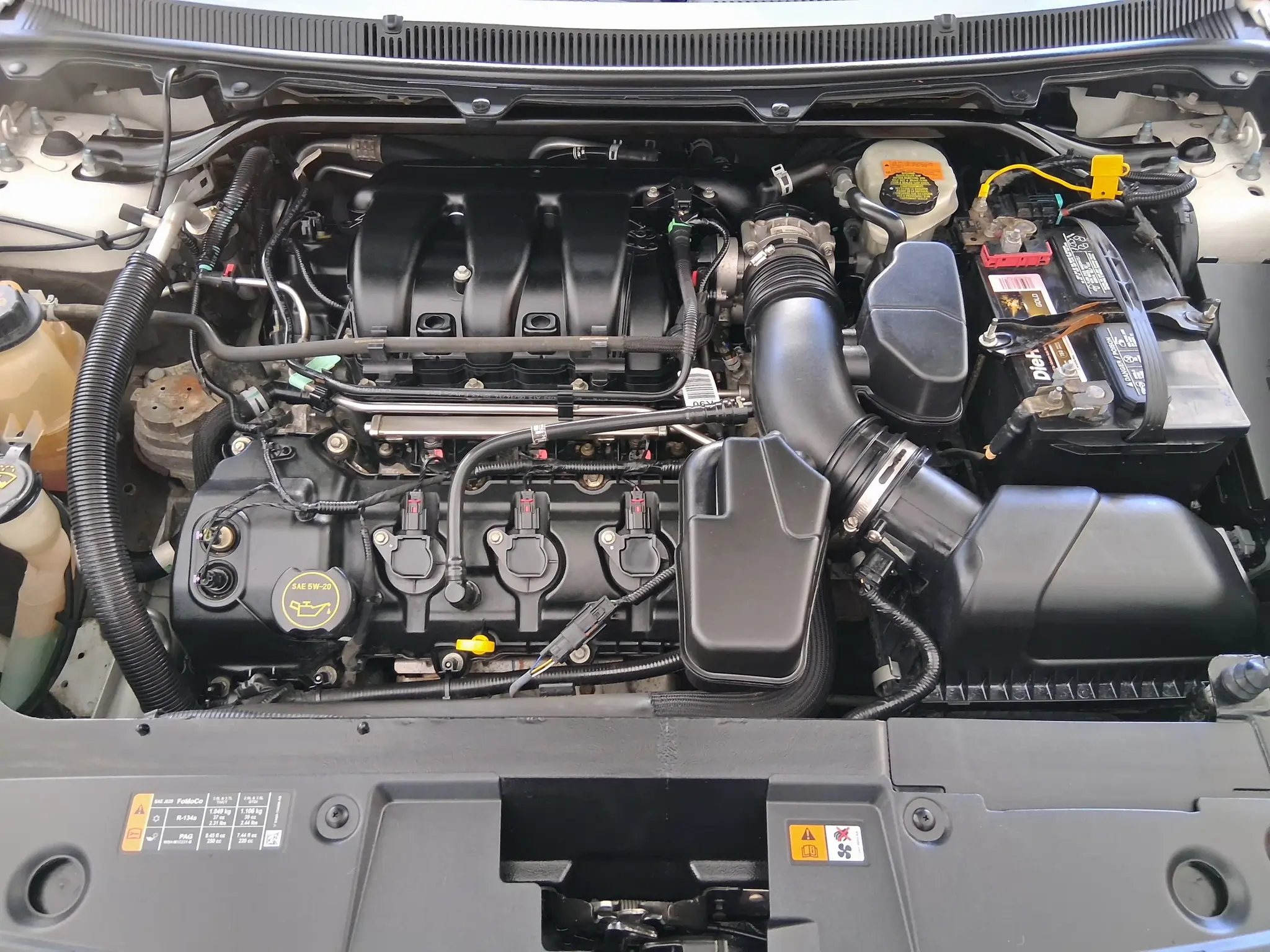 Engine detailing by Diamond Auto Spa — degreased and dressed engine bay